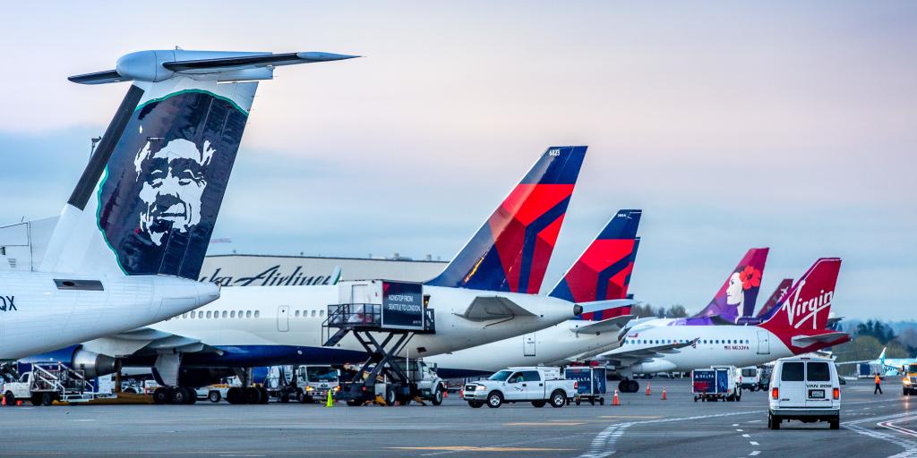 Airplanes parked at gates at SEA